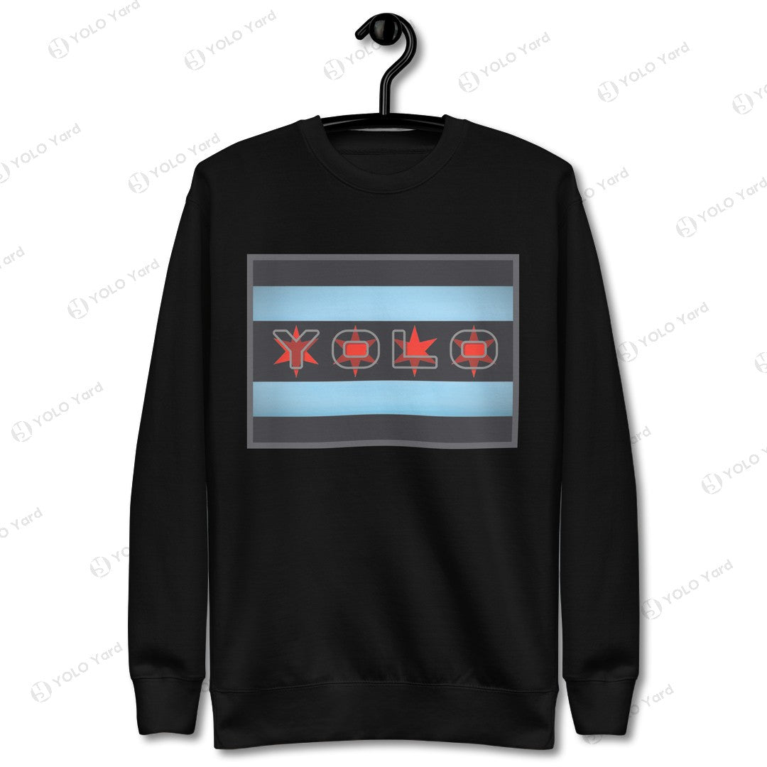 Black YOLO-Chicago Flag Ultra-Soft Premium Crew Neck Sweater on a hanger, showcasing its bold Chicago flag-inspired design.