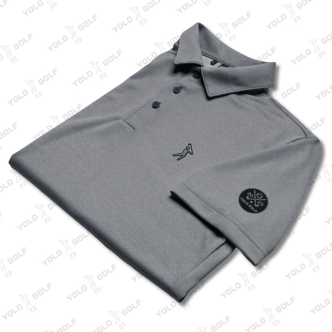 Space-Dyed Polo Shirt from YOLO Golf-adidas X Signature Black Edition in sleek gray with a modern fit. Features subtle branding and a stylish, contemporary design.