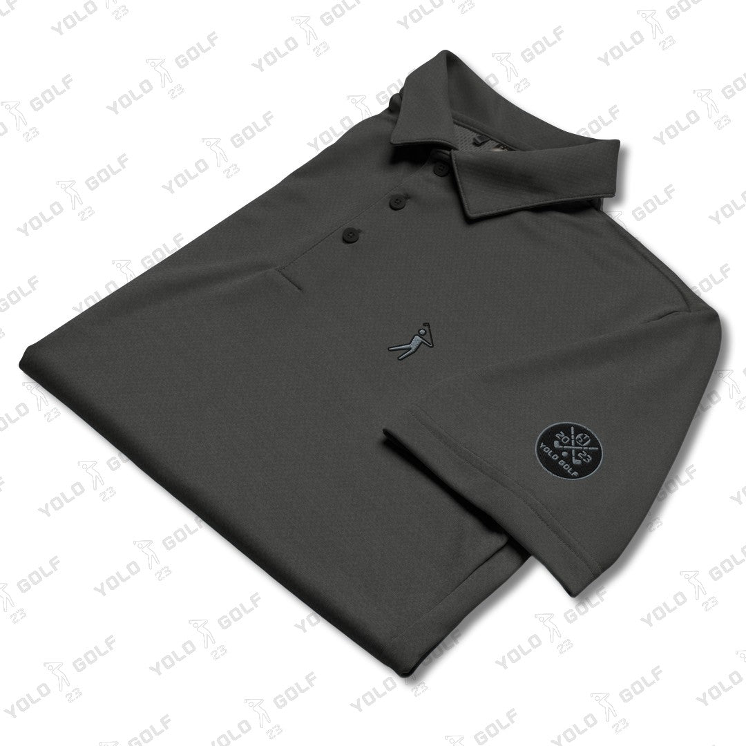 Space-Dyed Polo Shirt from YOLO Golf-adidas X Signature Black Edition in sleek black with a modern fit. Features subtle branding and a stylish, contemporary design.