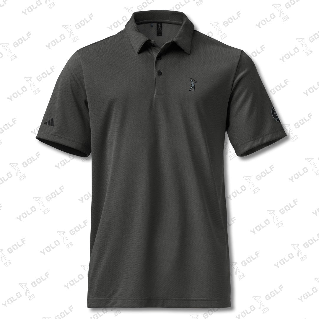 Space-Dyed Polo Shirt from YOLO Golf-adidas X Signature Black Edition in sleek black with a modern fit. Features subtle branding and a stylish, contemporary design.